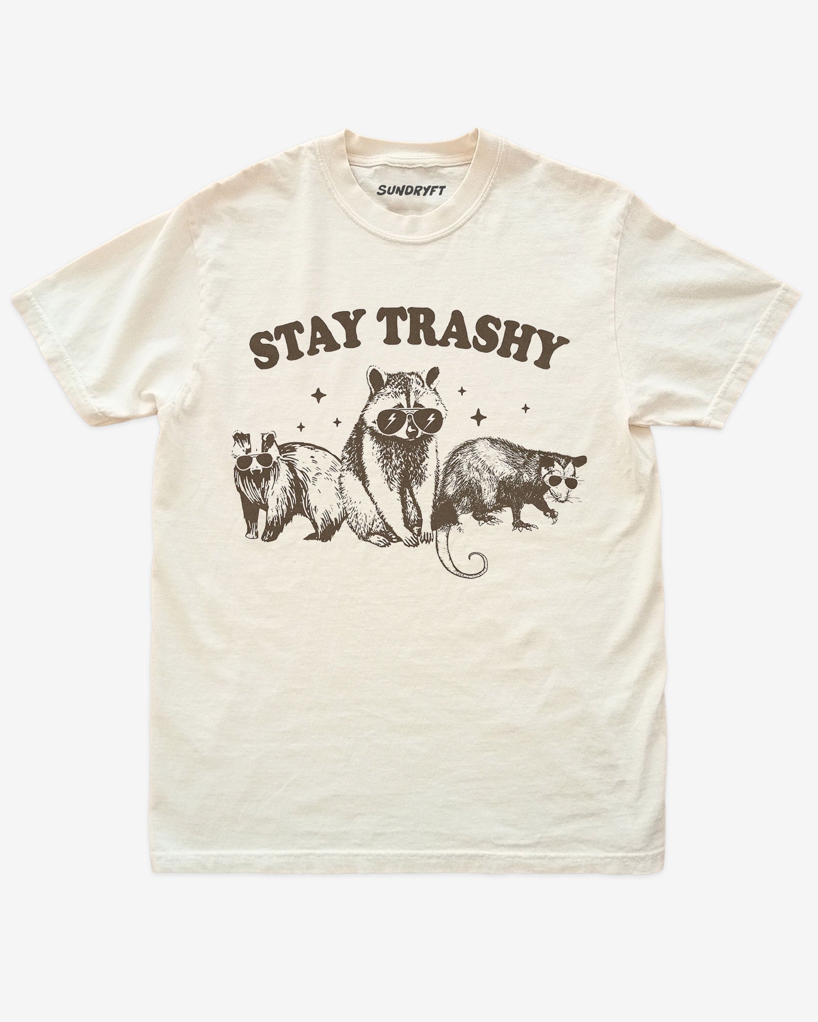 Stay Trashy shirt in ivory with funny retro graphic of raccoon, opossum and badger