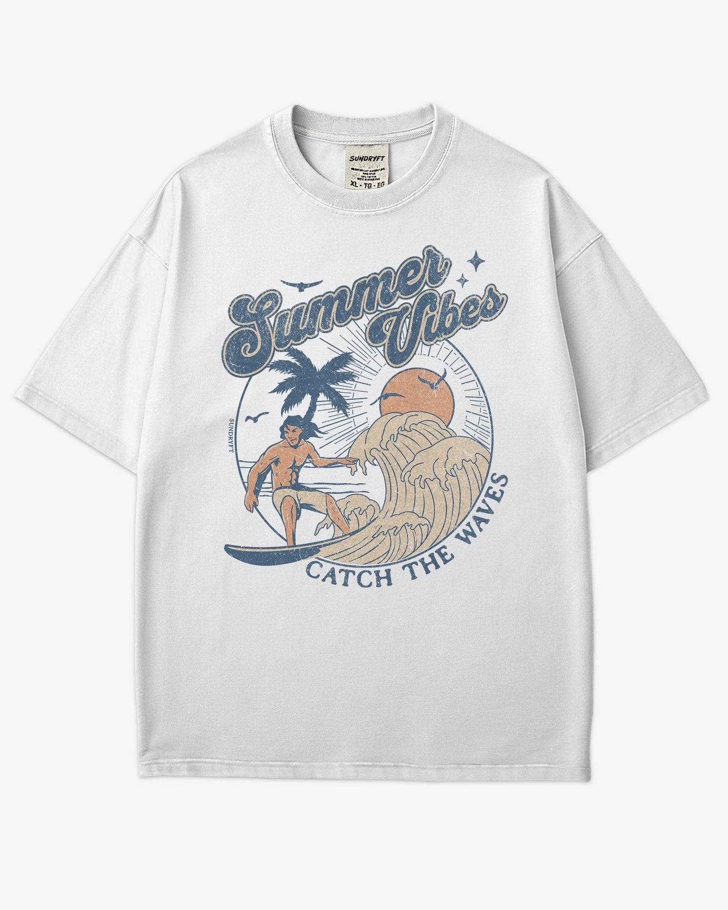 Flat lay white 'Summer Vibes – Catch the Waves' surf shirt with a retro graphic of a surfer riding a wave on the beach.