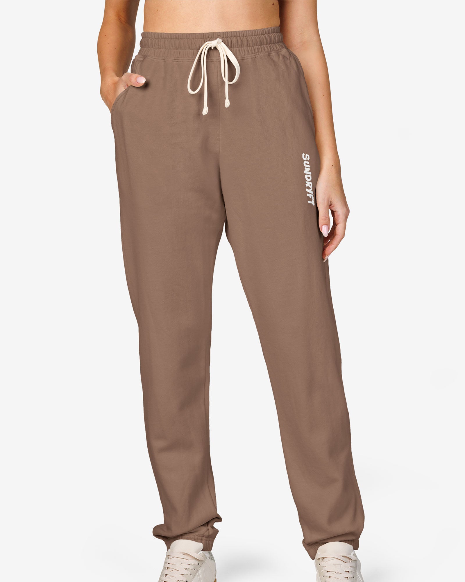 Woman wearing espresso color Sundryft unisex fleece sweatpants.