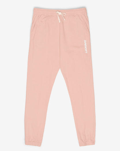 Flat lay peachy color Sundryft unisex fleece sweatpants.