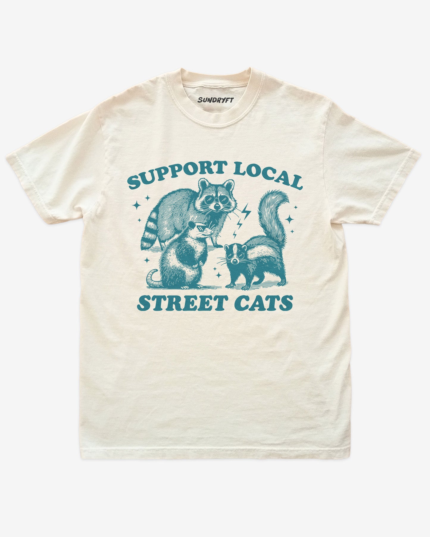 Support Local Street Cats shirt in ivory with funny graphic of raccoon, opossum, and skunk wearing sunglasses