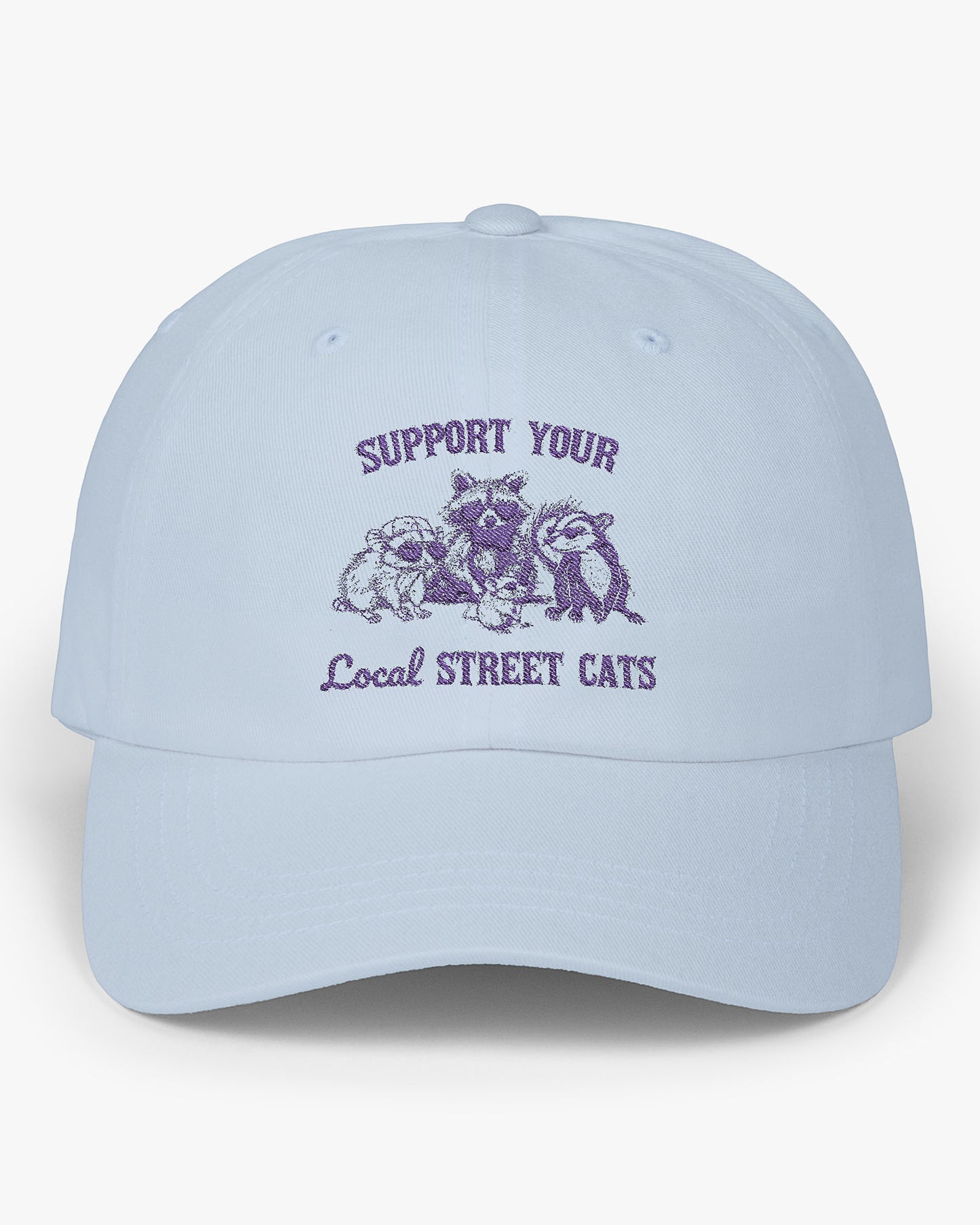 Light blue dad cap with the quote 'Support Your Local Street Cats' and a funny retro raccoon and opossum graphic.
