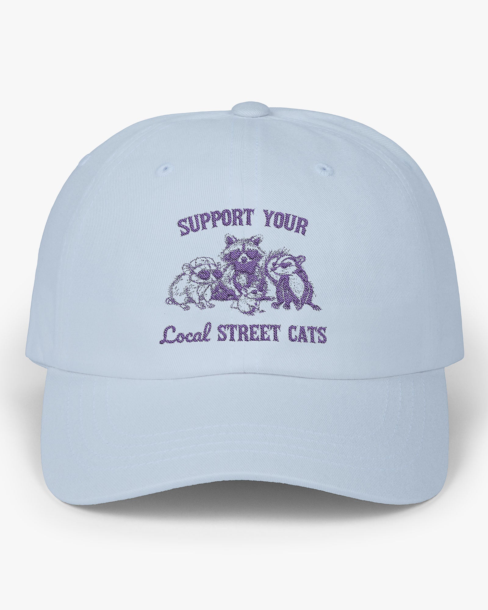 Light blue dad cap with the quote 'Support Your Local Street Cats' and a funny retro raccoon and opossum graphic.