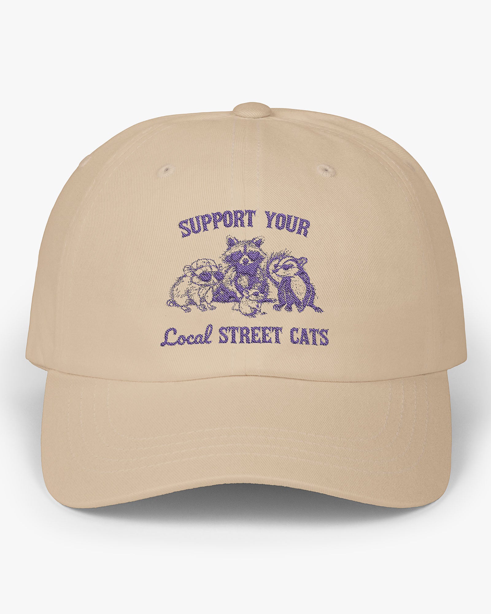 Beige dad cap with the quote 'Support Your Local Street Cats' and a funny retro raccoon and opossum graphic.