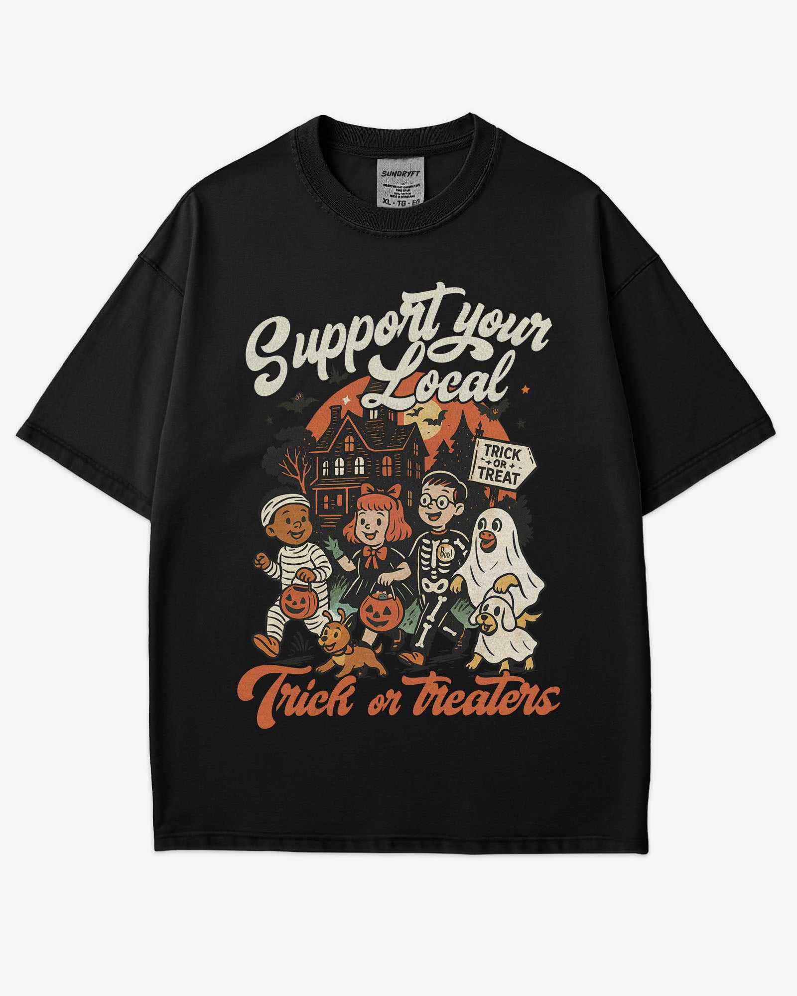 Flat lay black ‘Support Your Local Trick Or Treaters’ shirt with retro Halloween graphic of kids trick-or-treating near a haunted house.