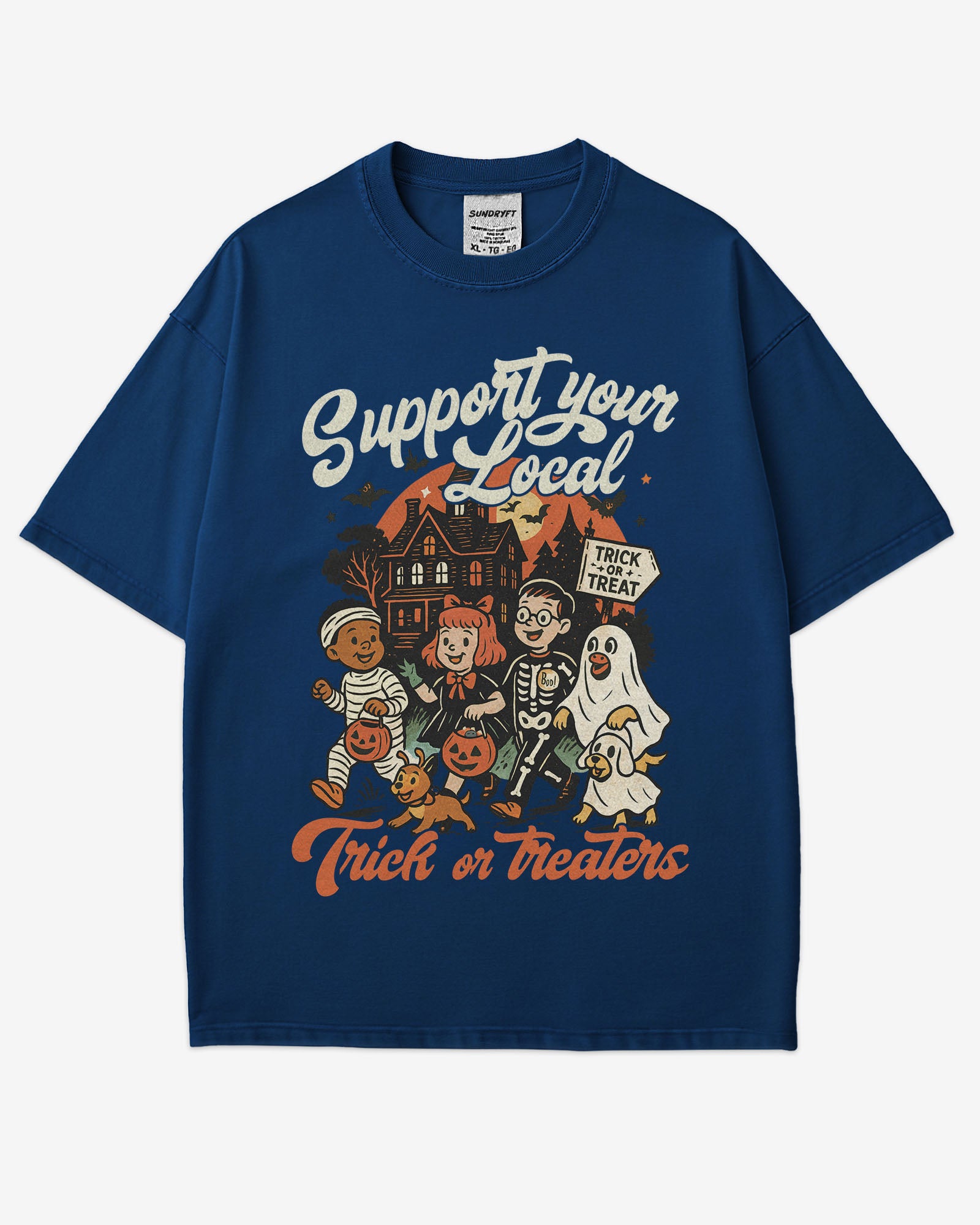 Flat lay true navy ‘Support Your Local Trick Or Treaters’ shirt with retro Halloween graphic of kids trick-or-treating near a haunted house.