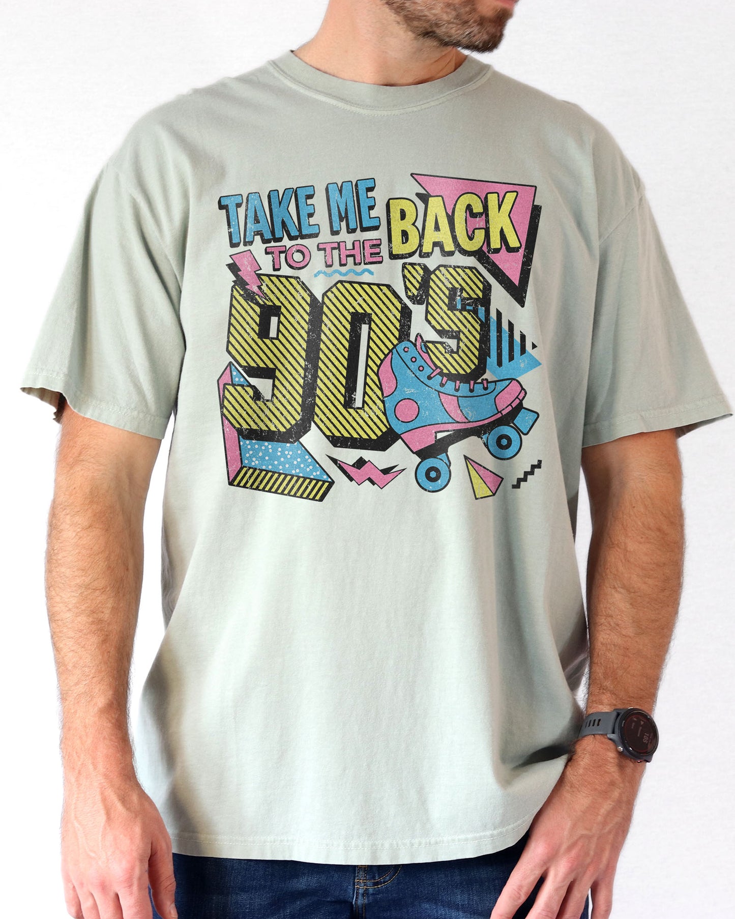 Man wearing a bay "Take Me Back To The 90's" retro graphic shirt.