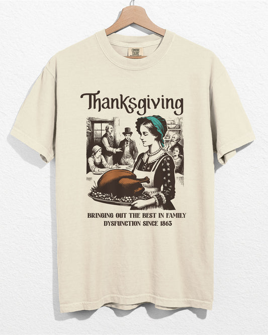 Ivory color hanger shirt with 'Thanksgiving - Bringing Out The Best In Family Dysfunction Since 1863' graphic design