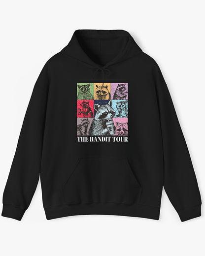Flat lay black 'The Bandit Tour' hoodie with funny retro raccoon collage 