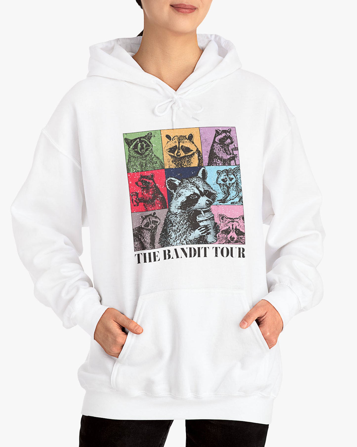 Woman wearing white 'The Bandit Tour' hoodie with funny retro raccoon collage 