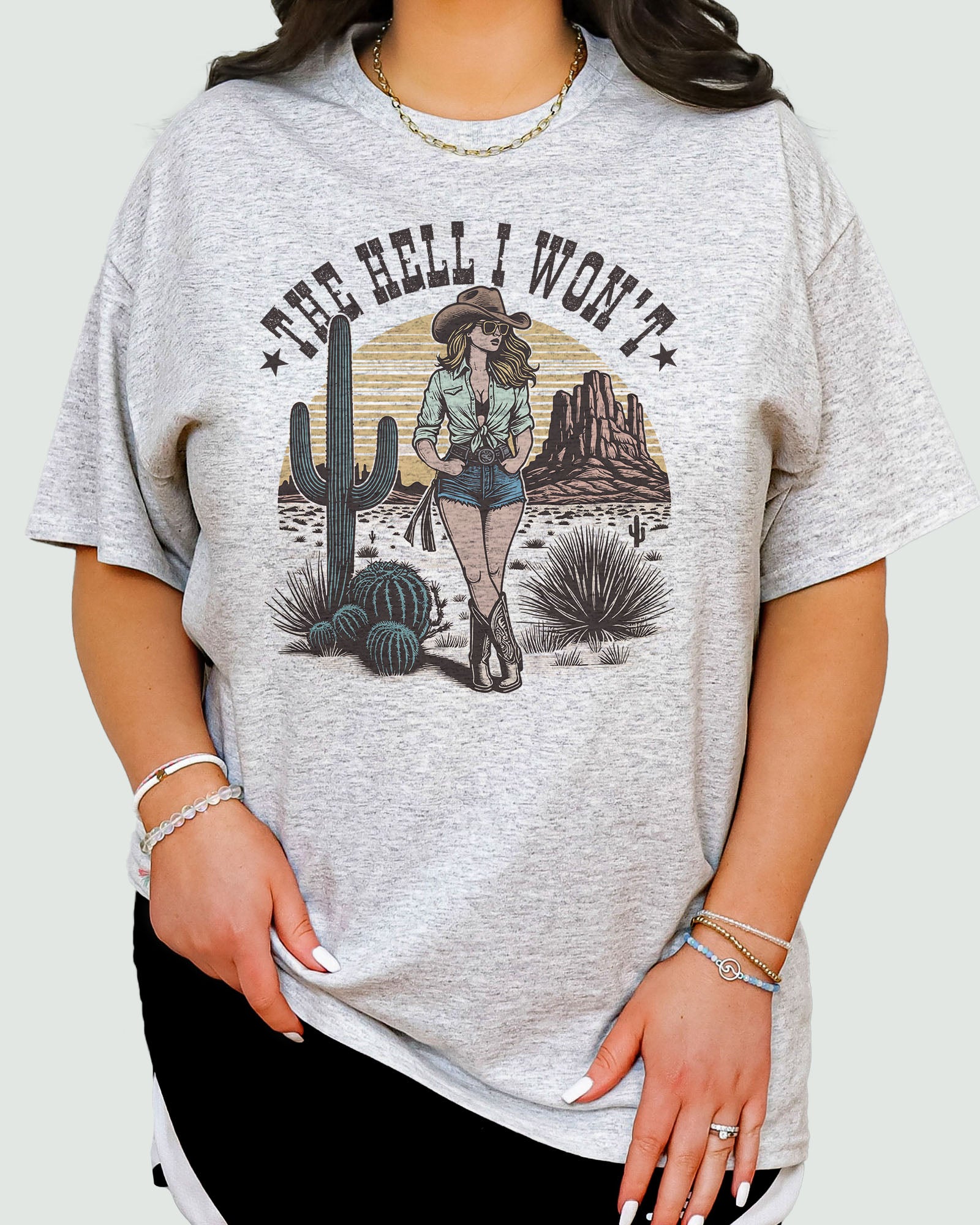 The Hell I Won't Shirt ash gray color tee with retro cowgirl graphic