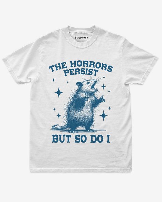 The Horrors Persist, But So Do I shirt in white with funny retro opossum graphic