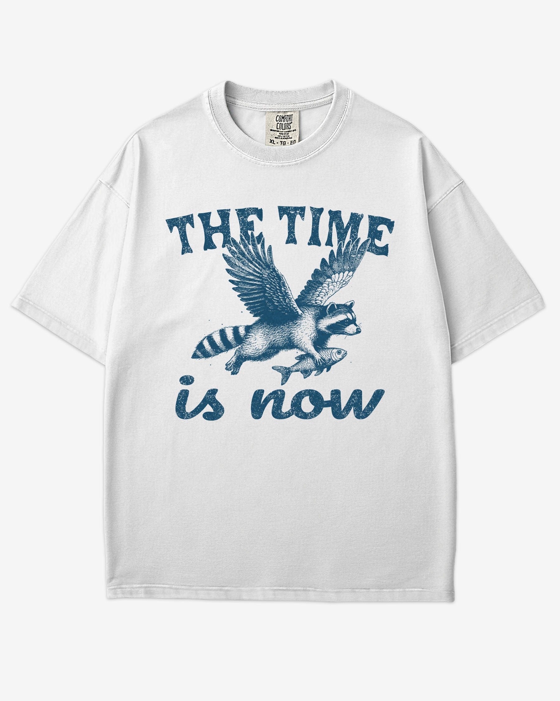The Time Is Now Shirt flat lay unisex white retro tee with funny flying raccoon graphic