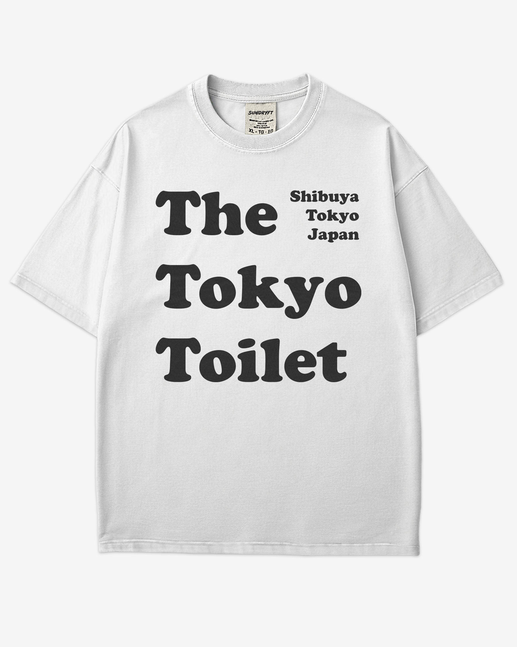 Flat lay white Tokyo Toilet shirt with a retro graphic inspired by Shibuya’s public restrooms.