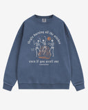 They’re Burning All The Witches Sweatshirt flat lay denim color retro graphic with skeletons dancing in fire