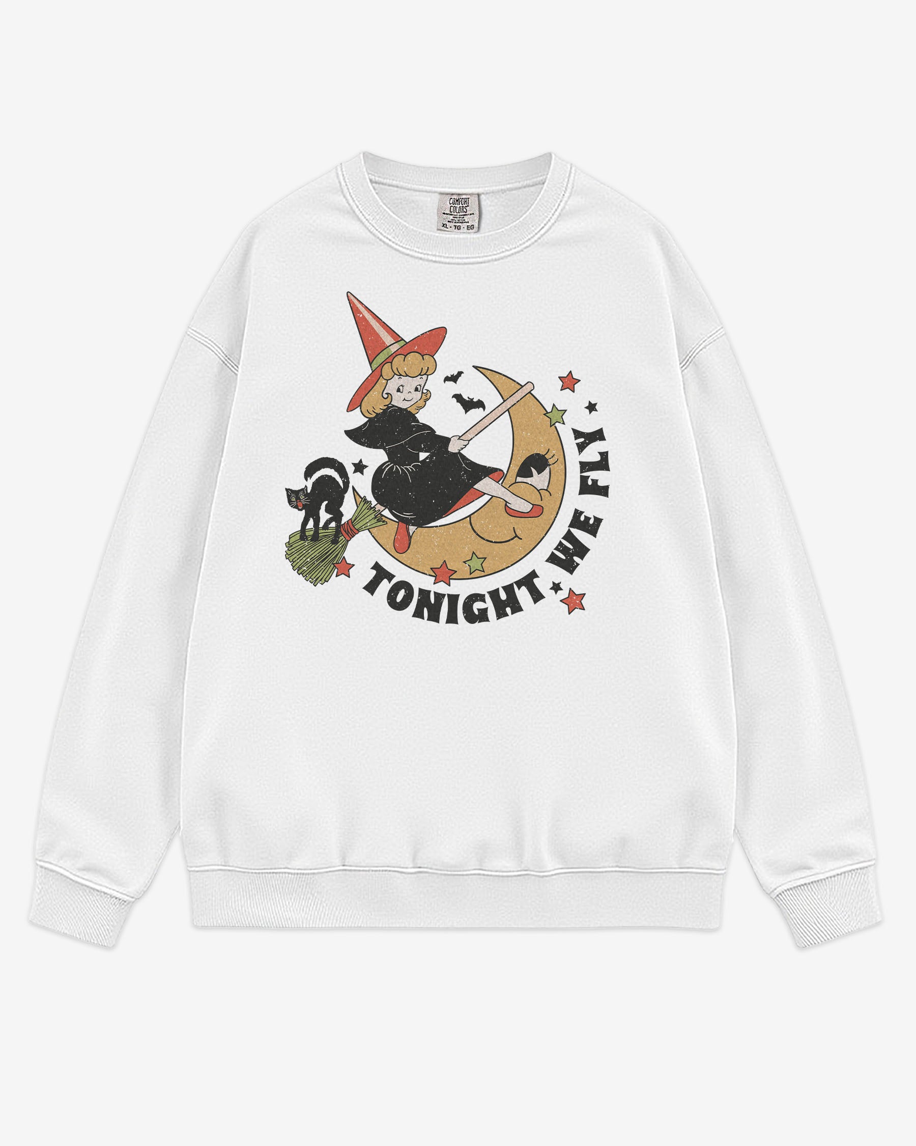 Flat lay white Tonight We Fly sweatshirt with retro witch on broomstick, moon, and black cat Halloween graphic clothing.