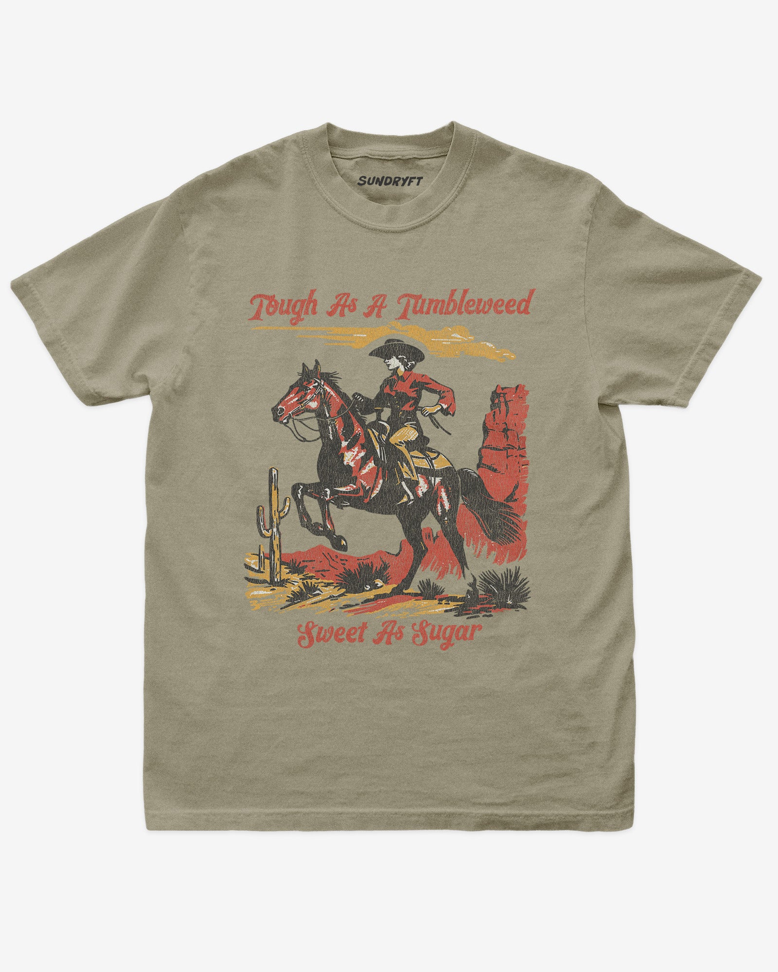 Tough As A Tumbleweed Sweet As Sugar shirt in khaki with distressed retro graphic of cowgirl riding on a horse through desert