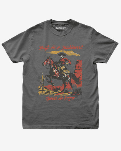 Tough As A Tumbleweed Sweet As Sugar shirt in pepper with distressed retro graphic of cowgirl riding on a horse through desert