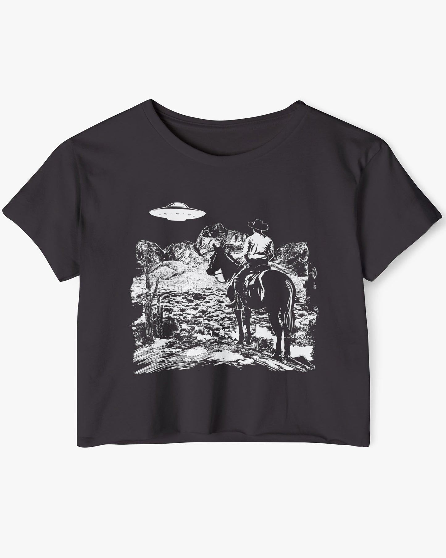 Flat-lay black crop top featuring a UFO and western desert scenery graphic.