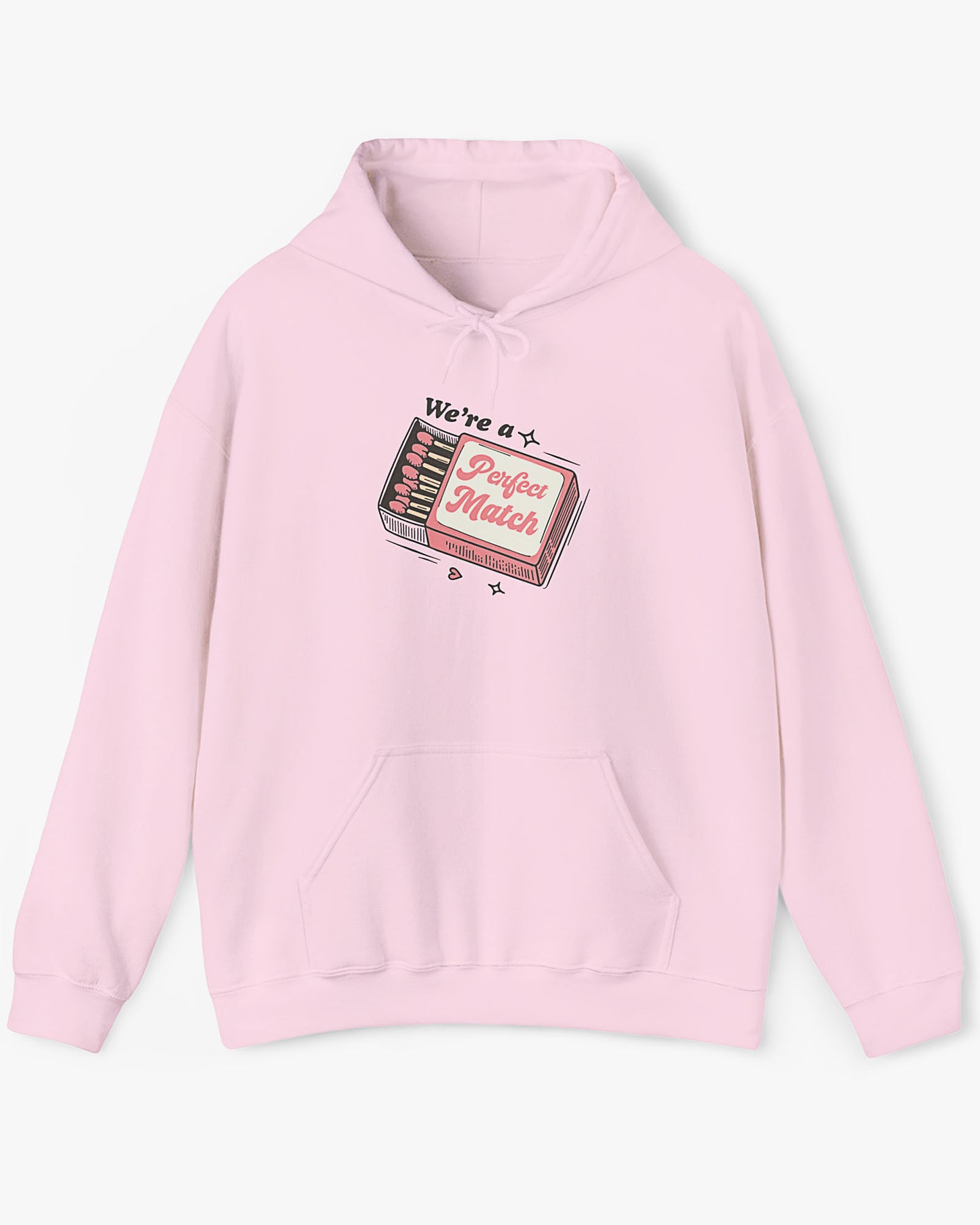 Flat lay light pink 'We're A Match' hoodie with retro matchbox valentine's Day graphic