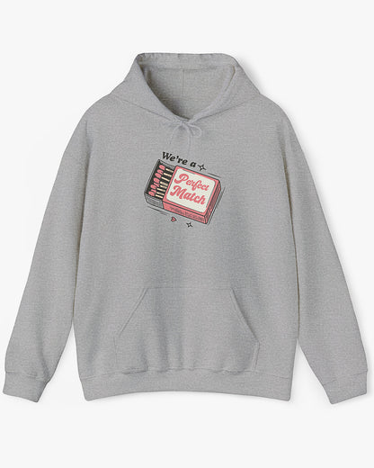 Flat lay sport gray 'We're A Match' hoodie with retro matchbox valentine's Day graphic