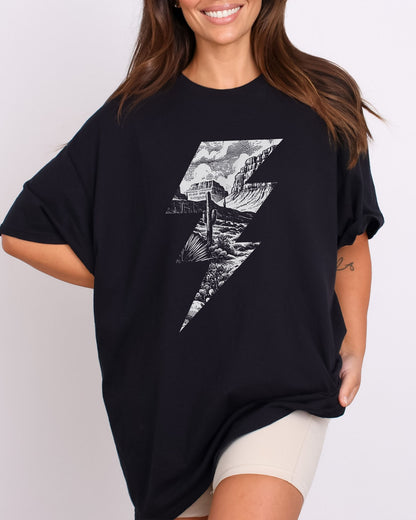 Model wearing black color shirt with 'Western Lightning Bolt' graphic design