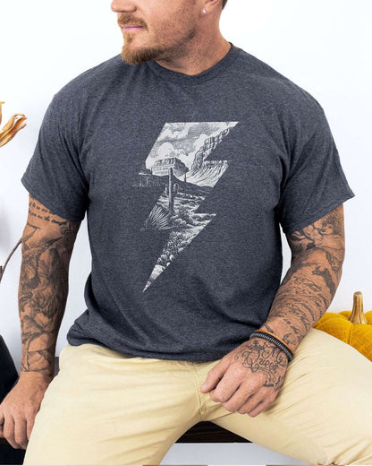 Model wearing dark heather color shirt with 'Western Lightning Bolt' graphic design
