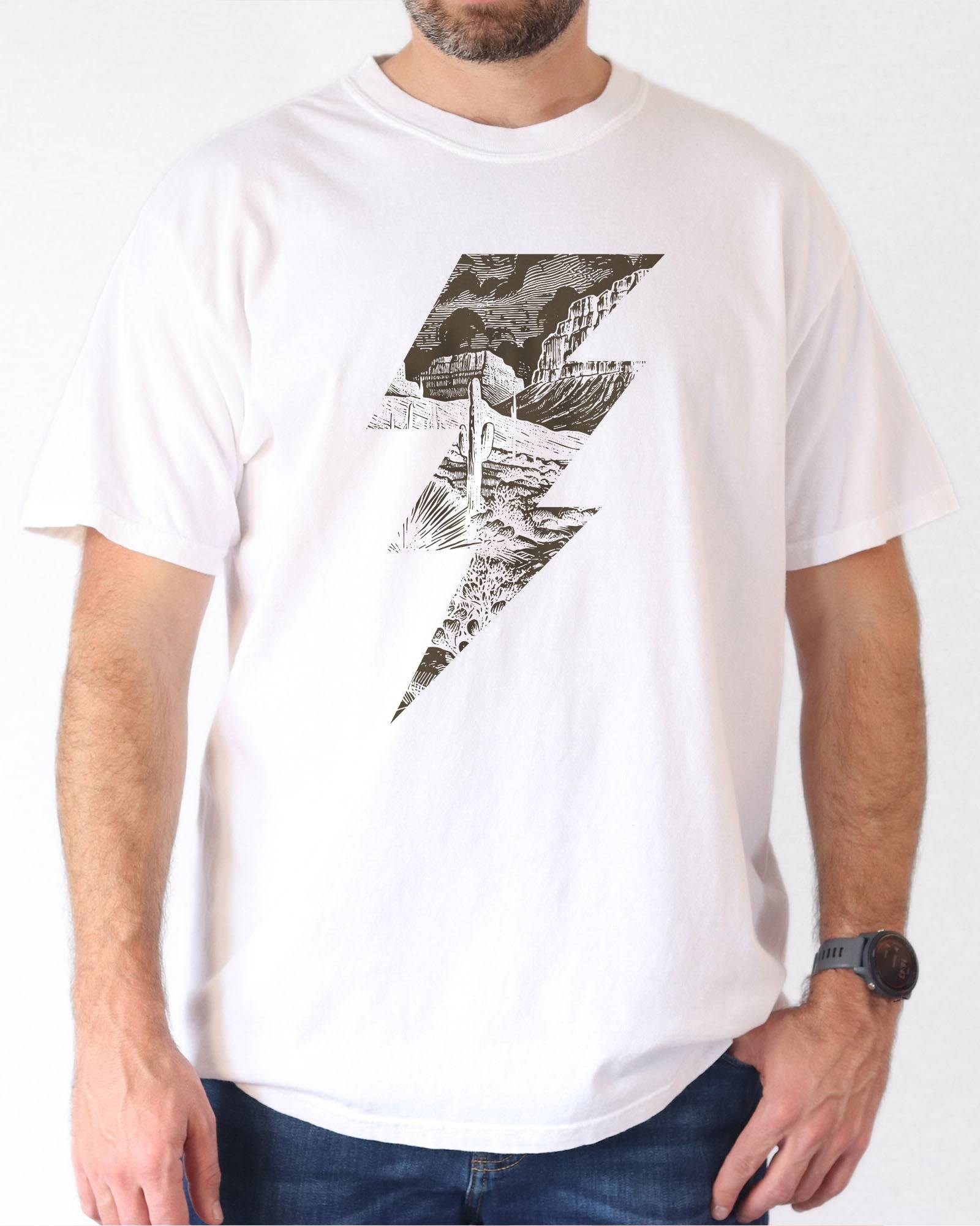 Model wearing white color shirt with 'Western Lightning Bolt' graphic design