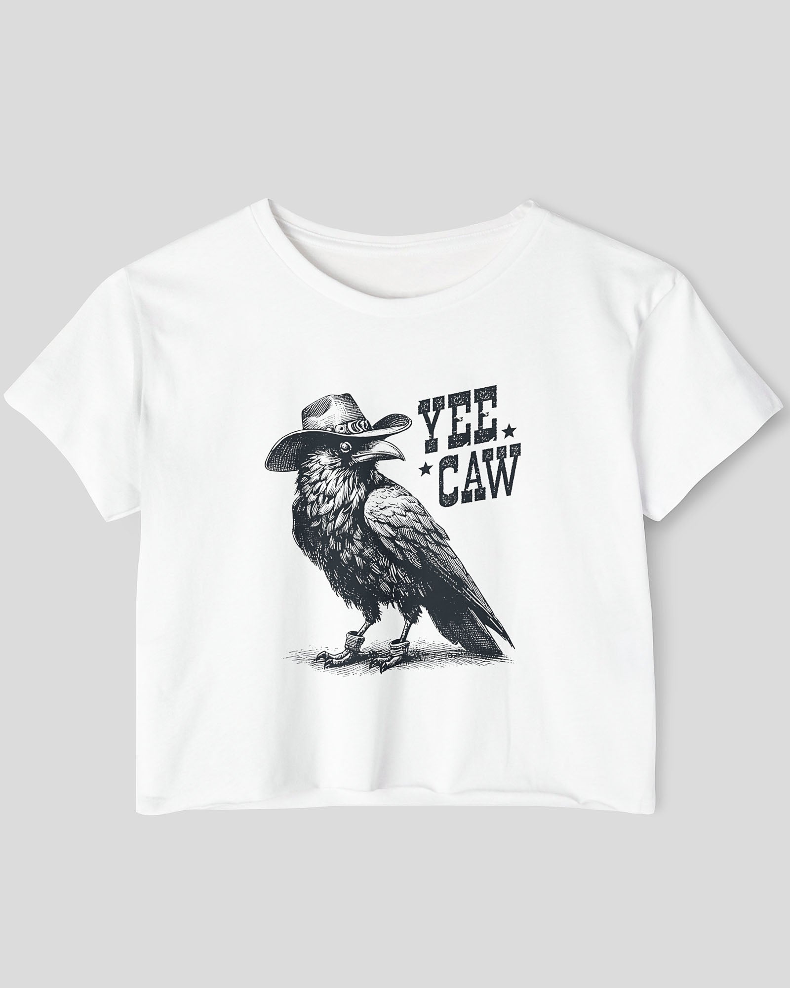 Flat lay white-colored 'Yee Caw' crop top featuring a funny retro cowboy crow graphic.
