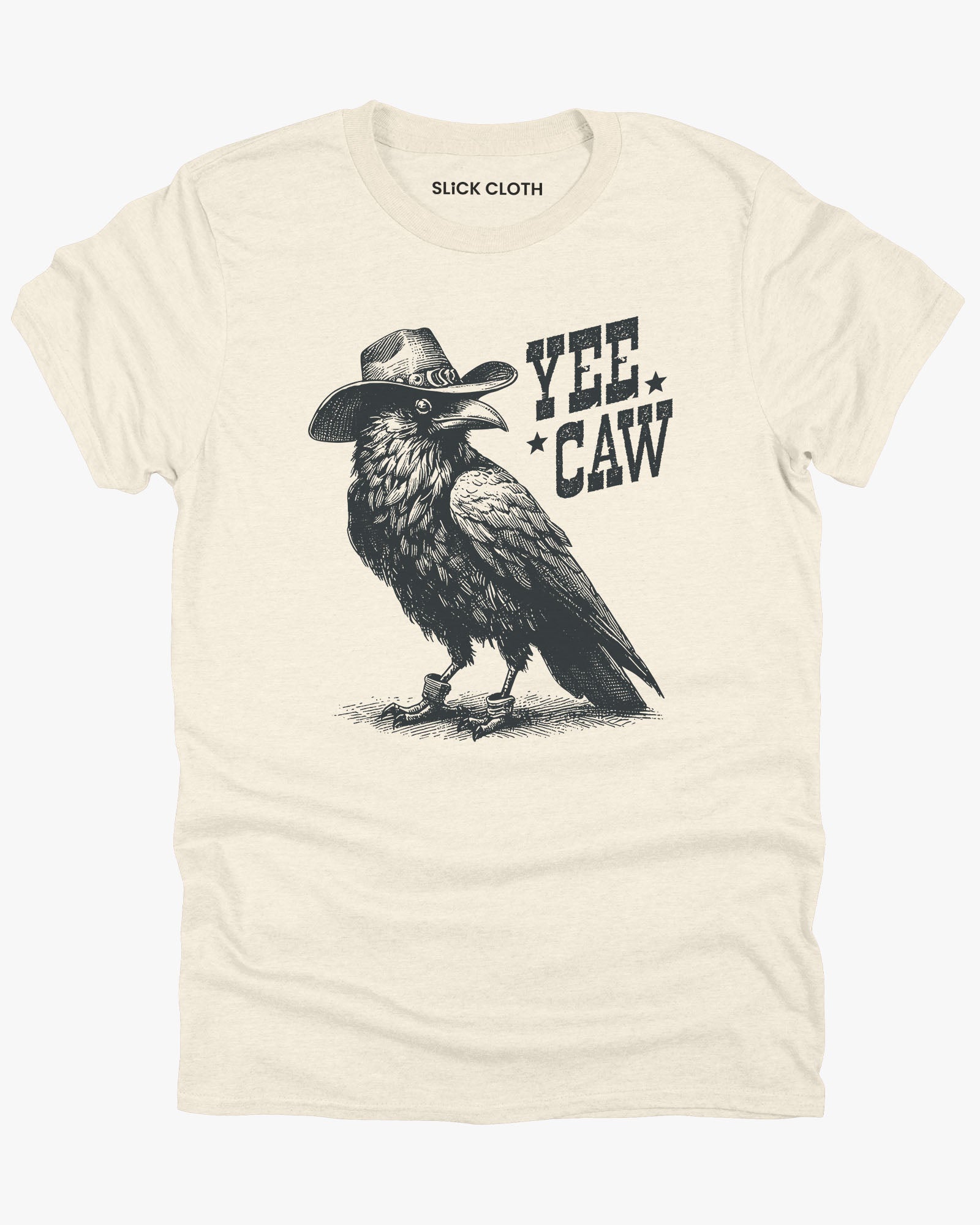 Flat lay natural-colored 'Yee Caw' shirt featuring a funny retro cowboy crow graphic.