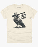 Flat lay natural-colored 'Yee Caw' shirt featuring a funny retro cowboy crow graphic.