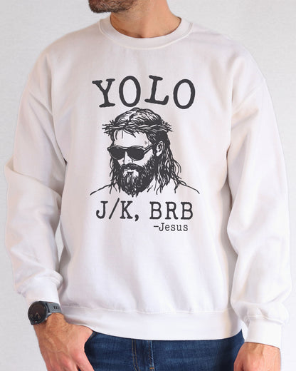 Model wearing white color sweatshirt with 'YOLO Jesus J/K BRB' graphic design