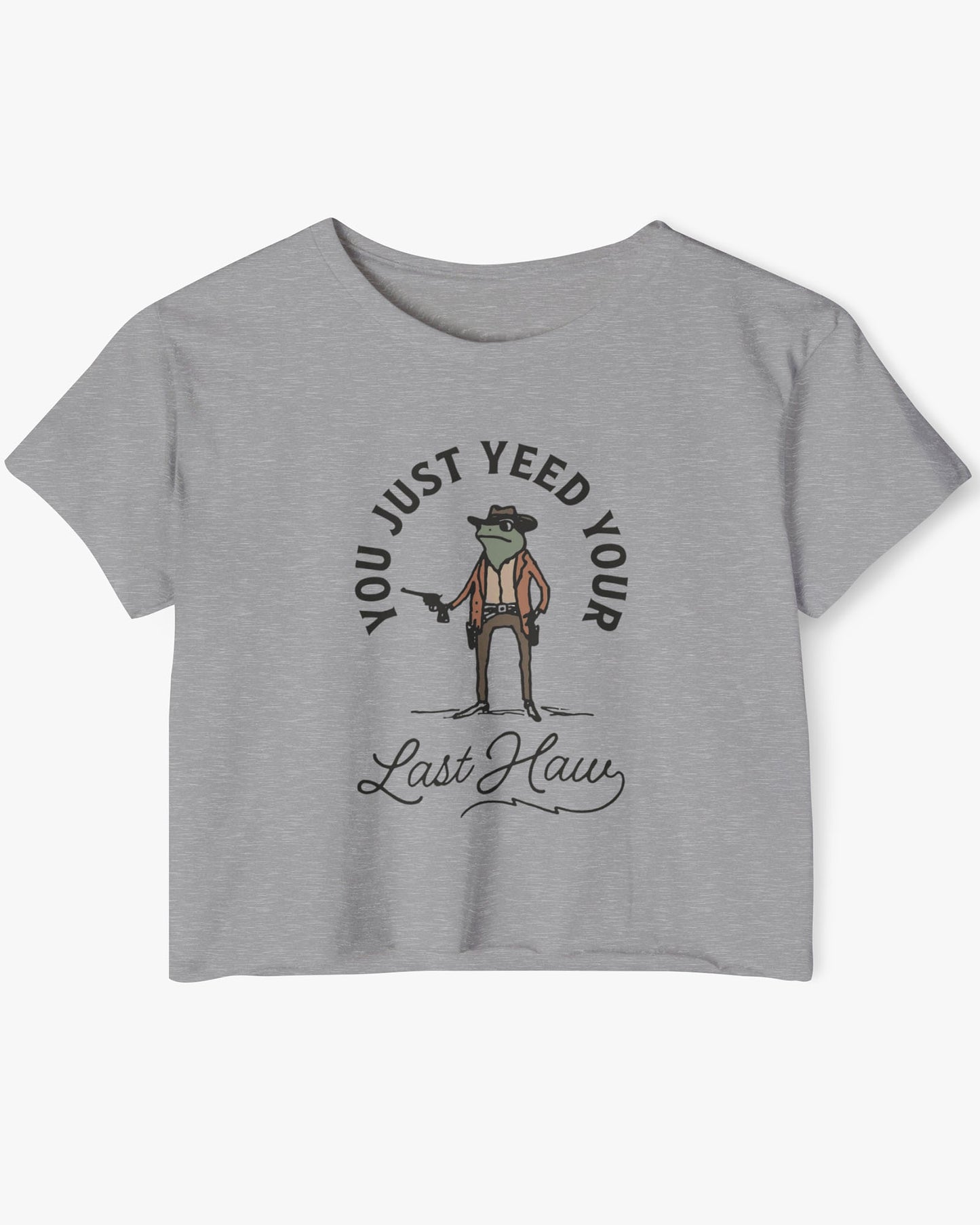 Flat lay of a heather gray crop top with a funny retro cowboy sheriff frog graphic and the text 'You Just Yeed Your Last Haw'.