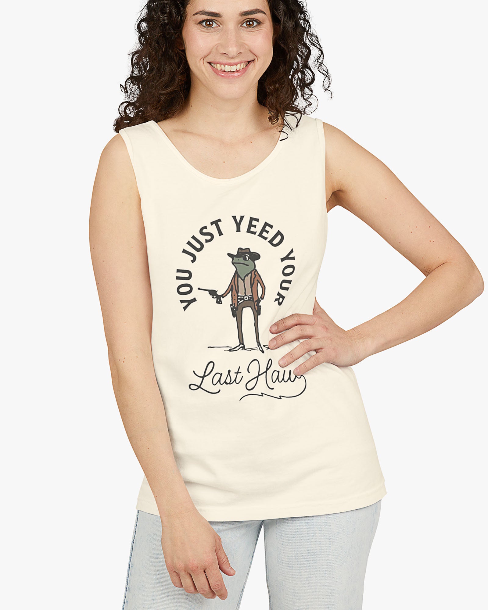 Woman wearing natural 'You Just Yeed Your Last Haw' tank top with funny retro cowboy frog graphic