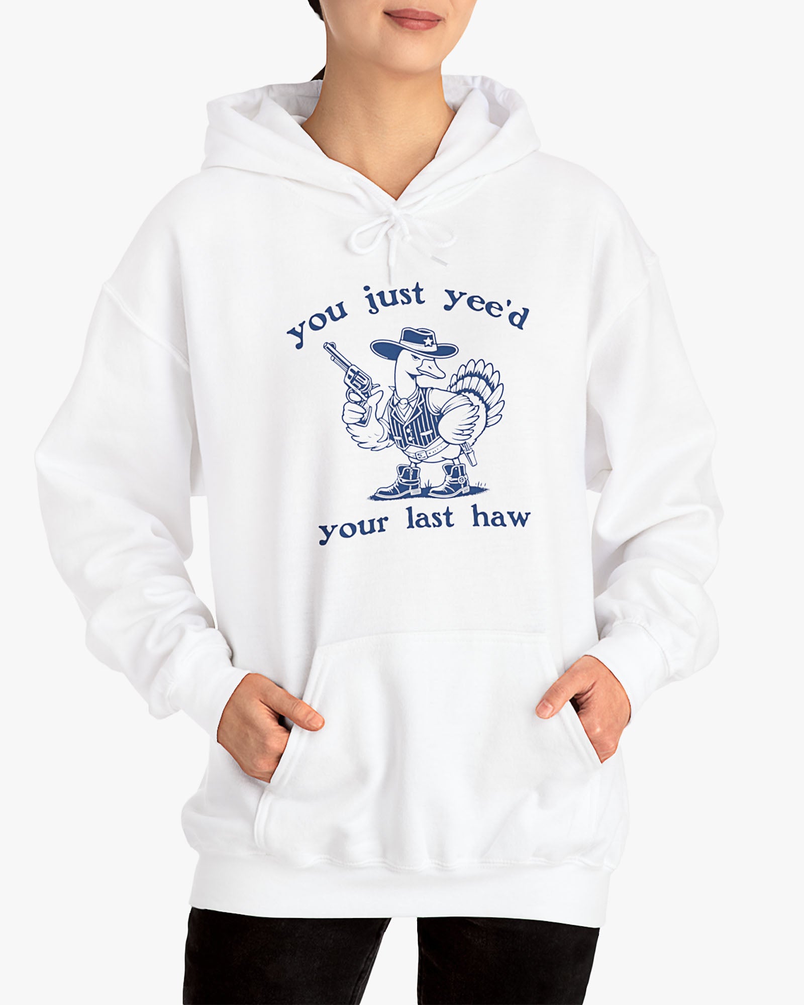 Woman wearing white 'You Just Yeed Your Last Haw' hoodie with funny retro cowboy goose graphic