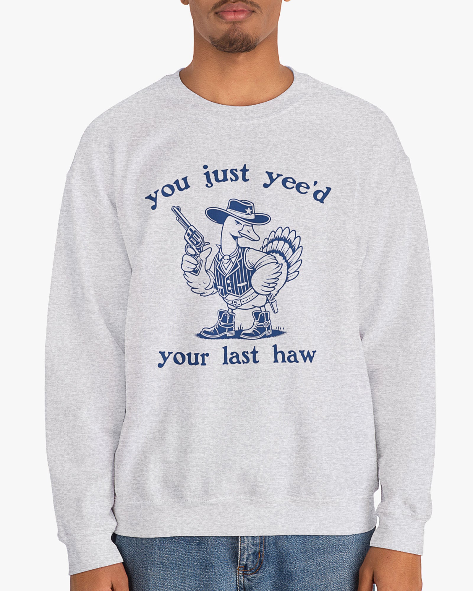 Man wearing ash gray 'You Just Yeed Your Last Haw' sweatshirt with funny retro cowboy goose graphic