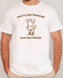 Man wearing funny retro graphic shirt in white color with the quote "You've Just Buttered Your Last Biscuit"