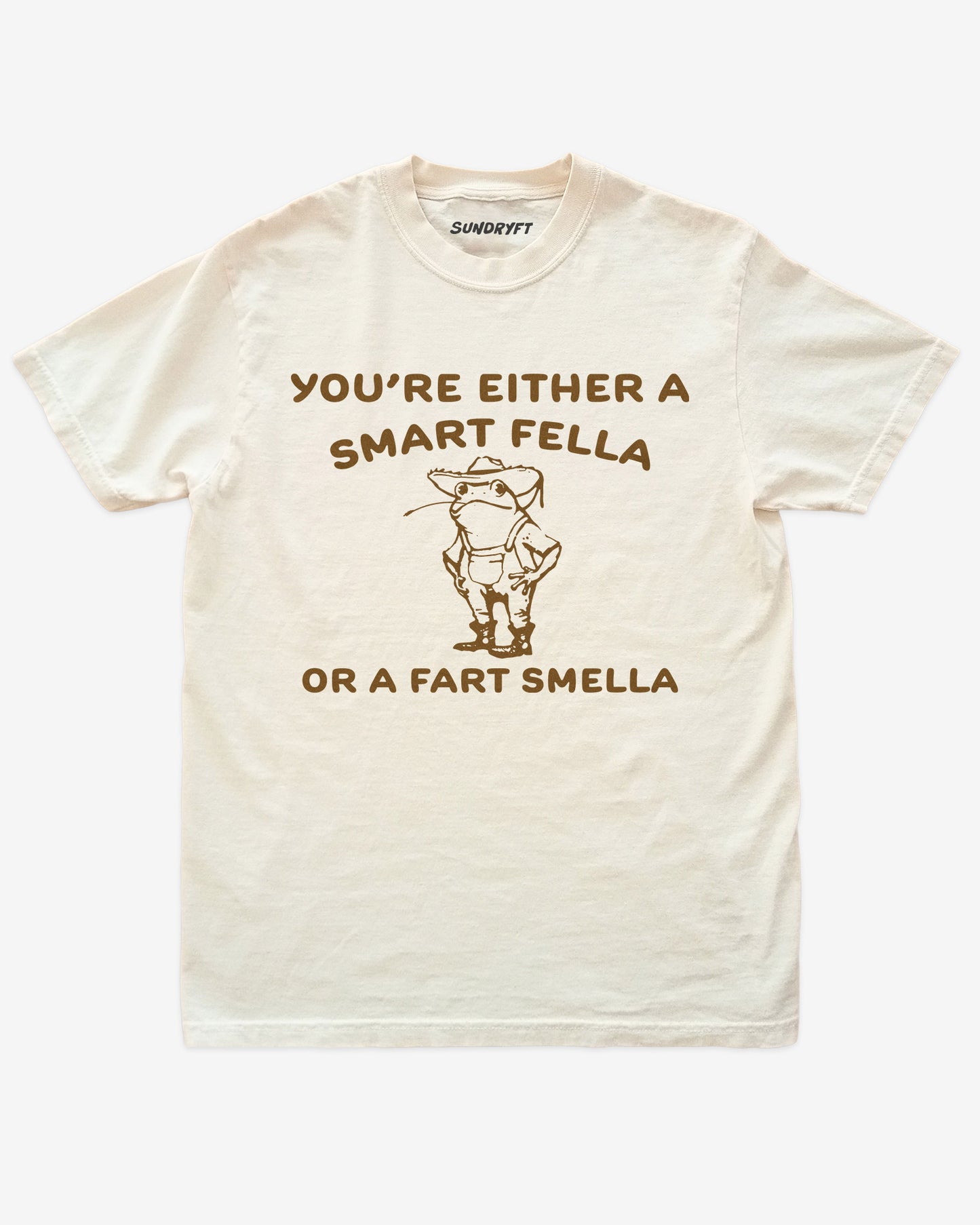 "You’re Either a Smart Fella or a Fart Smella" shirt in ivory with funny retro outline graphic of cowboy frog