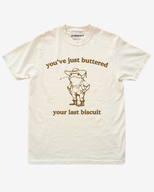 You've Just Buttered Your Last Biscuit shirt in ivory with funny retro cowboy frog graphic